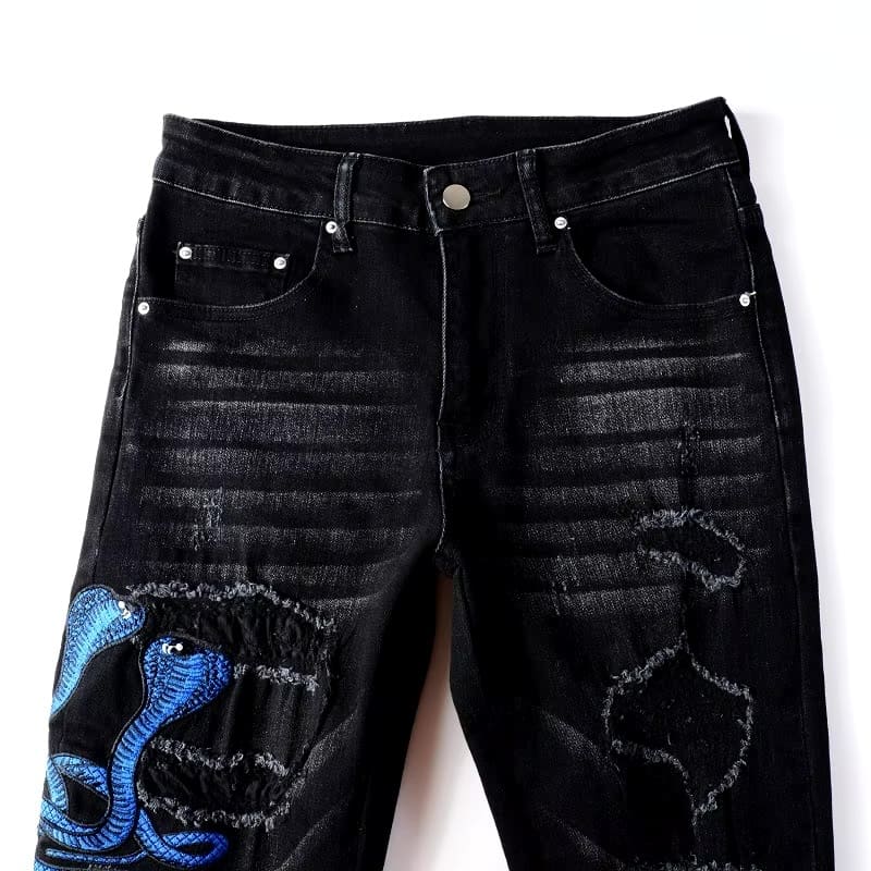 Schwarze Distressed-Jeans mit Schlangenstickerei