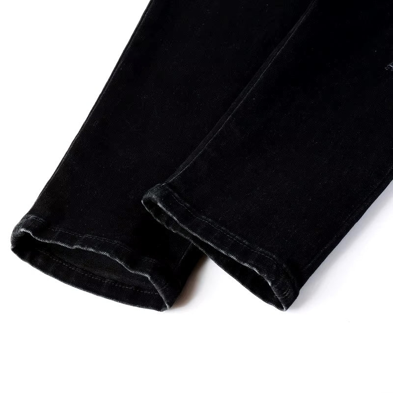 Schwarze Distressed-Jeans mit Schlangenstickerei