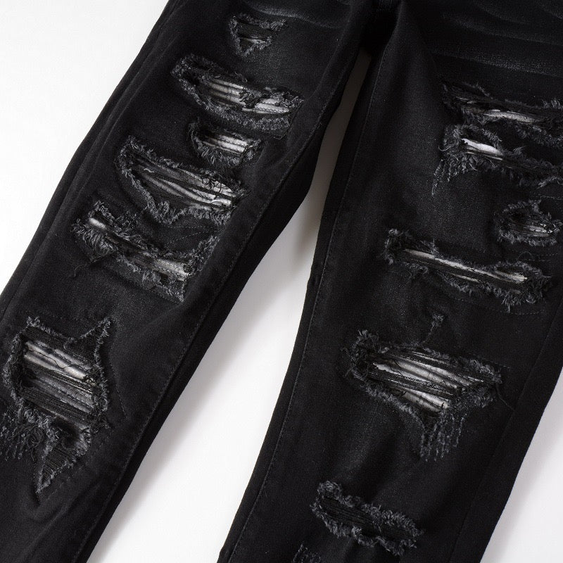 Graue Jeans mit Patches