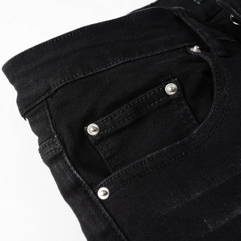 Graue Jeans mit Patches