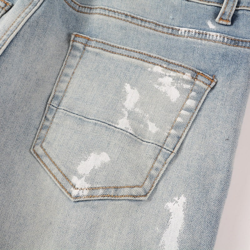 Fleckige Jeans